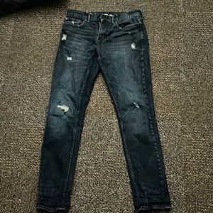 Dark blue ripped jeans